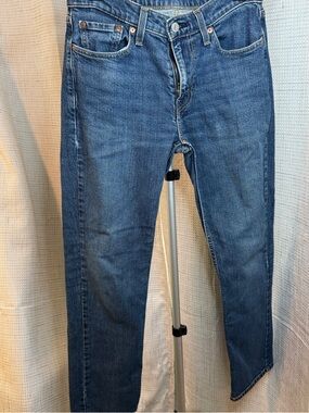 Levi's blue denim jeans with tan leather patch and red logo label